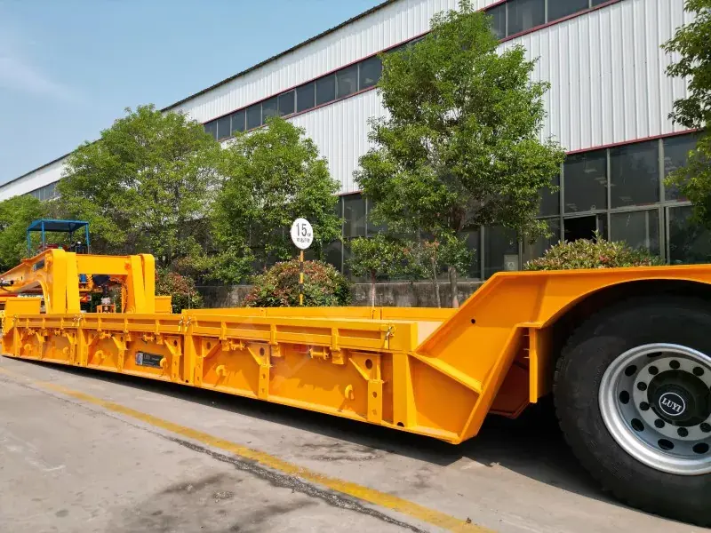 Wat maakt een semi-oplegger met een lage bed met een lage bed de ideale keuze voor het efficiënt transport van zware apparatuur?